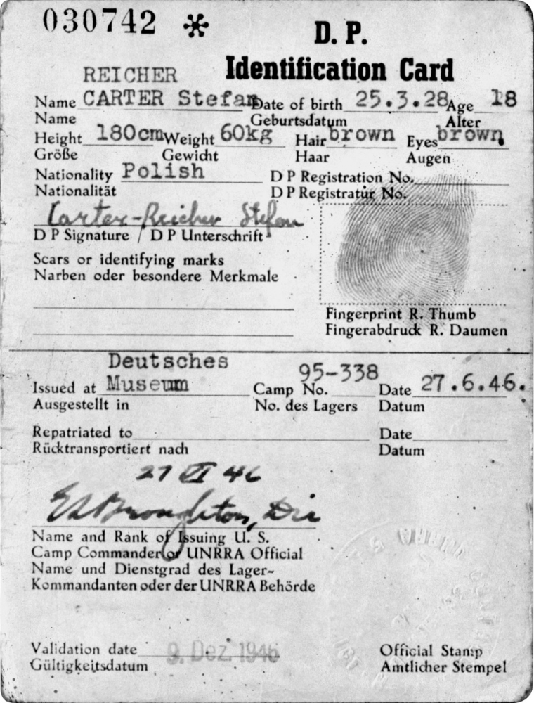 Dark grey form with white text mainly identifying the name, date of birth, nationality, and physical attributes of an individual. The document is signed and stamped with a fingerprint and official stamp.